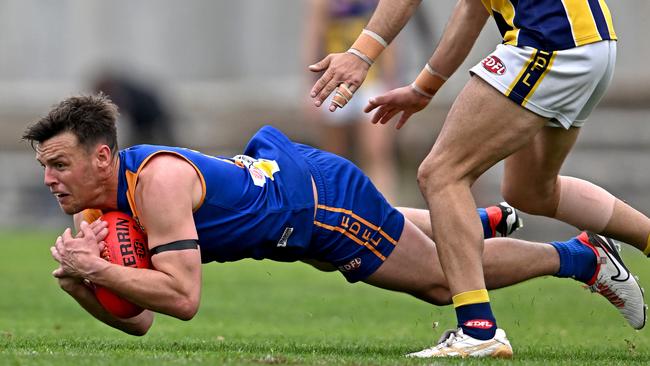 Deer Park’s Jack Dorgan takes a driving mark in the EDFL match on Saturday. Picture: Andy Brownbill