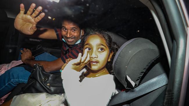 Nadesalingam Murugappan and his eldest daughter Kopika, 6, arrive in Perth on Tuesday after nearly two years on Christmas Island. Picture: Colin Murty