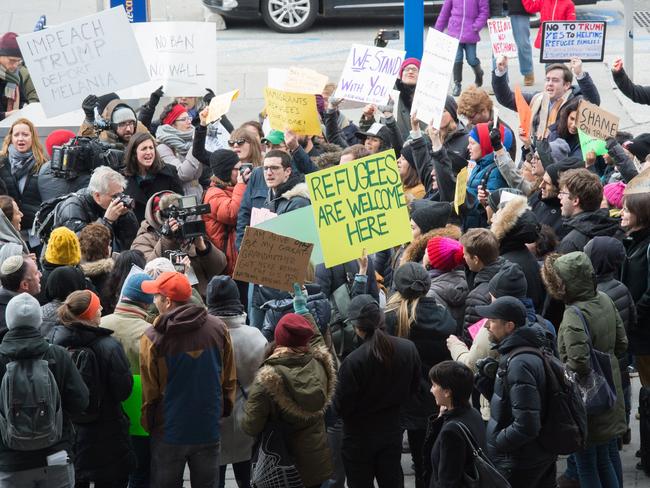 Protesters gather at JFK International Airport's Terminal 4 to demonstrate against US President Donald Trump's executive order. Picture: AFP