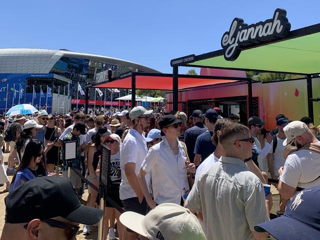 Punters line up for charcoal chicken at El Jannah's Australian Open store. Picture: Heath Parkes-Hupton