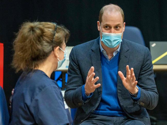 Britain's Prince William, Duke of Cambridge (R), is getting behind vaccination efforts. Picture: AFP