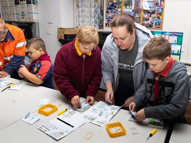 Chinchilla scouts have helped light the way for children living in poverty overseas, teaming up with Origin Energy to build solar powered lights. Photo/Origin Energy