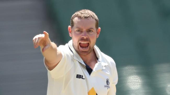 MELBOURNE, AUSTRALIA - OCTOBER 27:   Jon Holland of Victoria appeals during day three of the Sheffield Shield match between Victoria and Tasmania at the Melbourne Cricket Ground on October 27, 2016 in Melbourne, Australia.  (Photo by Scott Barbour/Getty Images)