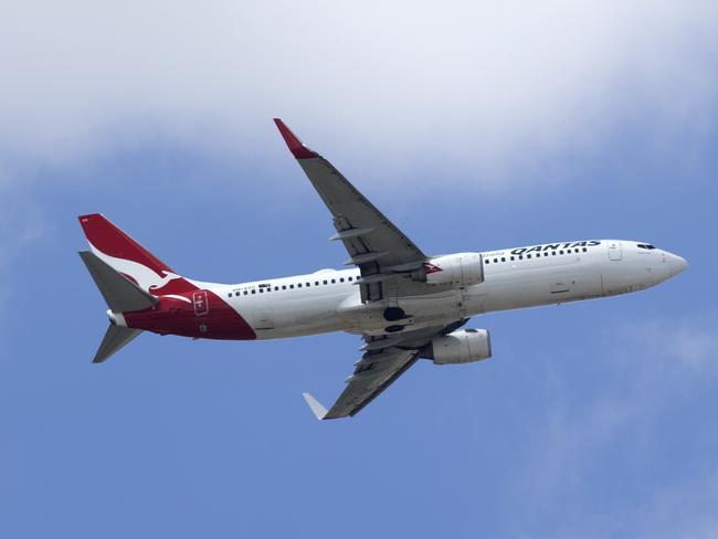 BRISBANE AUSTRALIA - NewsWire Photos SEPTEMBER 6, 2022: A Qantas plane leaves Brisbane Airport. Hundreds of Australians are stranded in Bali after multiple Jetstar flight cancellations leave travellers scrambling to find emergency accommodation. TheyÃre calling on Qantas to help bring them home. NewsWire / Sarah Marshall