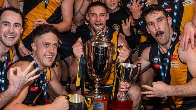 Heidelberg players celebrate their premiership clean sweep. Picture: Field of View Photography