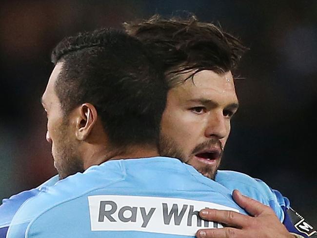 SYDNEY, AUSTRALIA - MAY 03: Adam Ashley-Cooper and Alofa Alofa of the Waratahs celebrates victory in the round 12 Super Rugby match between the Waratahs and the Hurricanes at Allianz Stadium on May 3, 2014 in Sydney, Australia. (Photo by Mark Metcalfe/Getty Images)