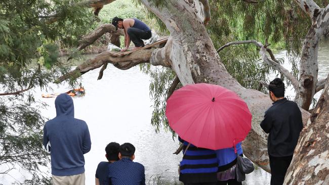 The boy’s family gathered to pay their respects. Picture: David Crosling