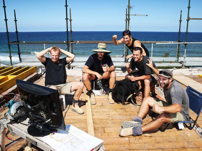 Meanwhile in Sydney ... Construction workers in Wariewood stop work to watch the Melbourne Cup on site. Picture: Tim Hunter.