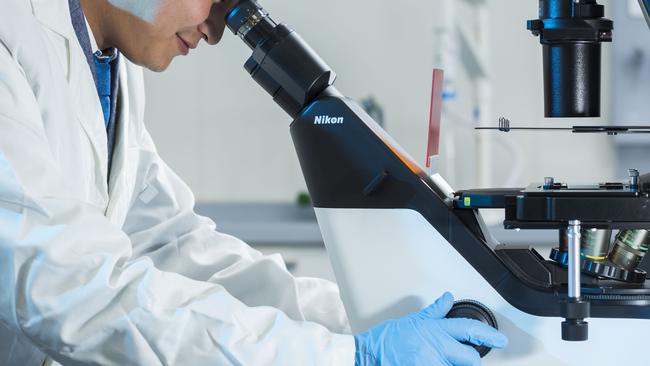 A PhD student at a lung cancer research centre. Picture: AAP/Matthew Vasilescu