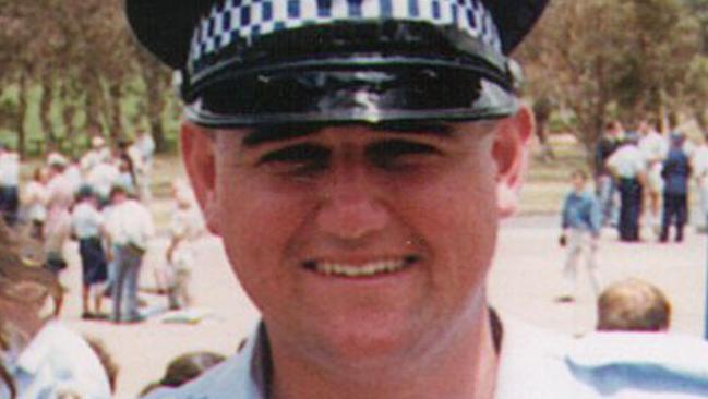 Highway Patrol officer Glenn McEnally was shot in 2002.