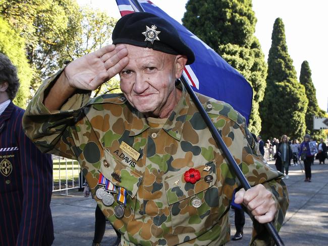 2021 ANZAC Day March along St Kilda Road finishing at the Shrine of Remembrance. Lance Corporal Arthur Davis Engineers regiment salutes the crowd during the parade.                       Picture: David Caird