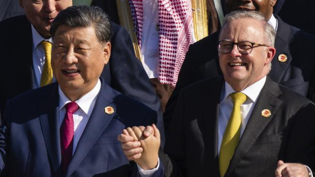 China's President Xi Jinping and Australia's Prime Minister Anthony Albanese with other leaders at the G20 Summit in Rio de Janeiro.