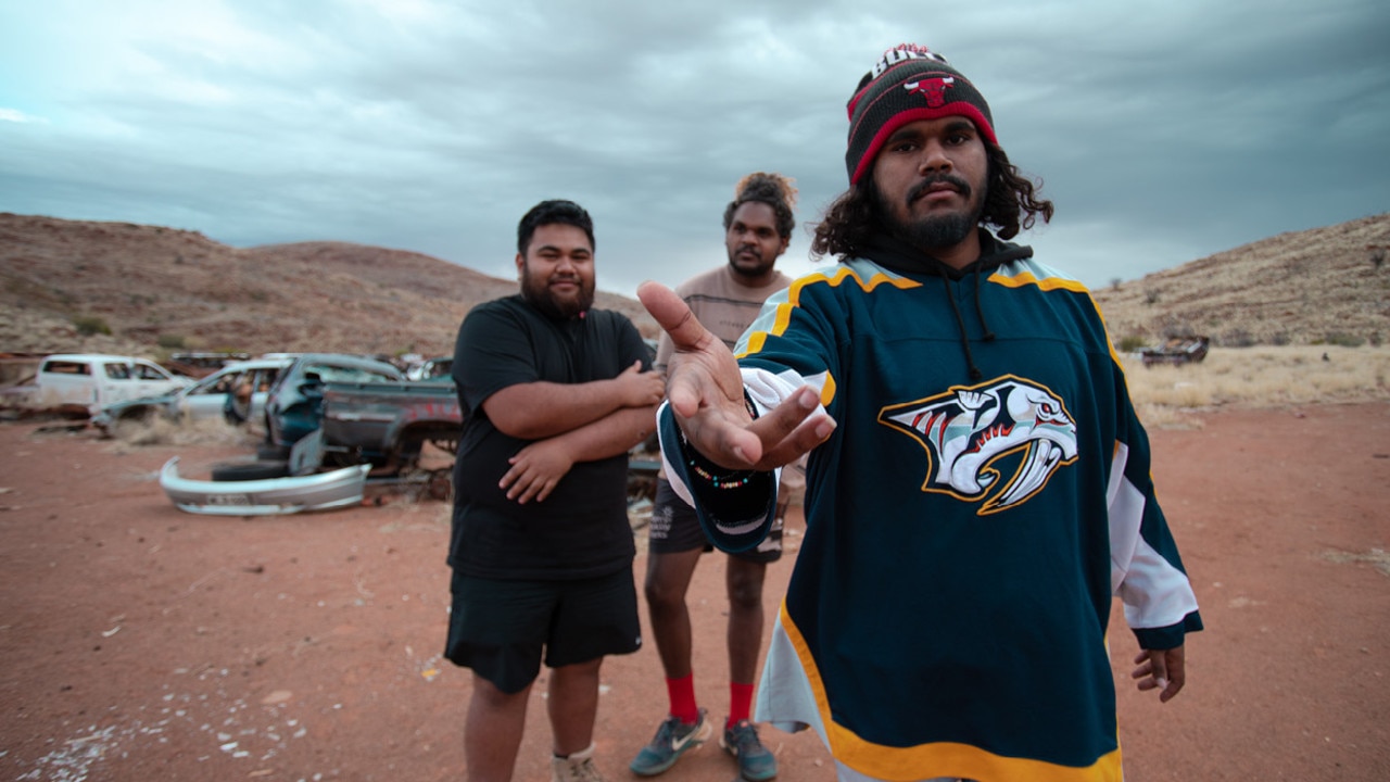 Dem Mob with Jontae Lawrie and Elisha Umuhuri (front) in the APY Lands. Picture: Supplied