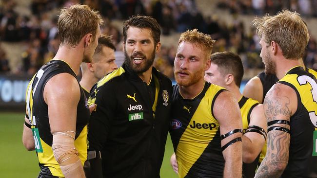 The ‘backline bandits’ were quick to get around their leader after his round 1 injury. Pic: Michael Klein