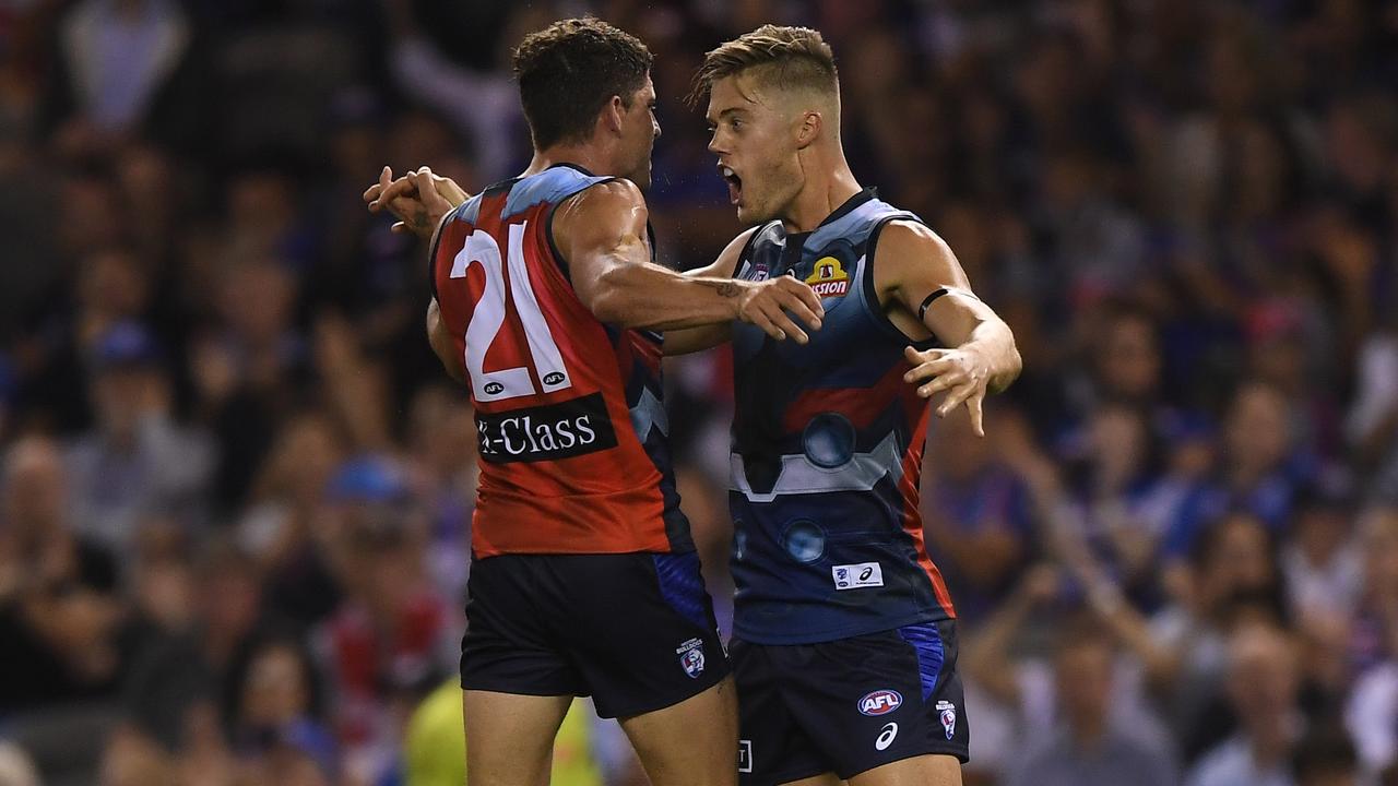 Tom Liberatore and Josh Schache celebrate a Western Bulldogs goal against Sydney. Picture: AAP Images 