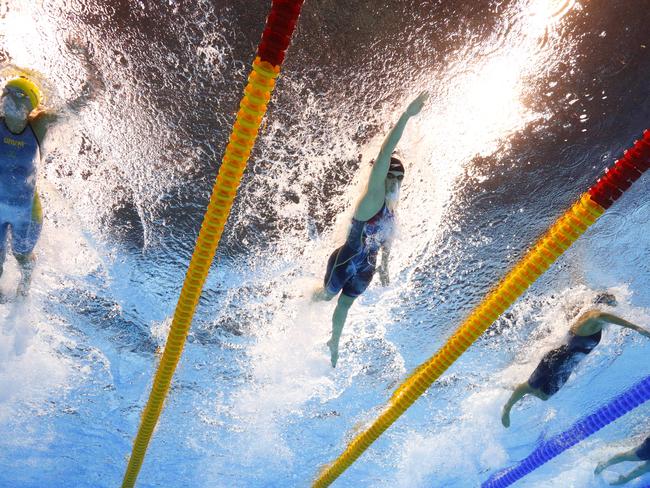 Katie Ledecky, centre, competes in the 200m freestyle semi-final.