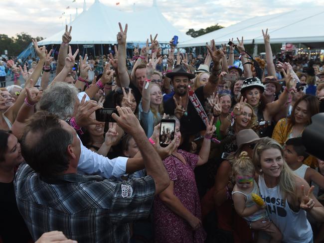 Michael Franti performs out in the general area with crowds at Bluesfest 2018 in Tyagarah near Byron Bay.