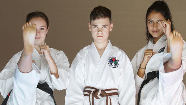 MANLY DAILY/ AAP Photo (L to R) Sasha Lewis, Chase McLean & Nina Von-Huben in the Brookvale dojo on Thursday the 3rd October 2019.These 3 martial art athletes are heading to the Australian martial art titles.AAP IMAGE/ Tim Pascoe