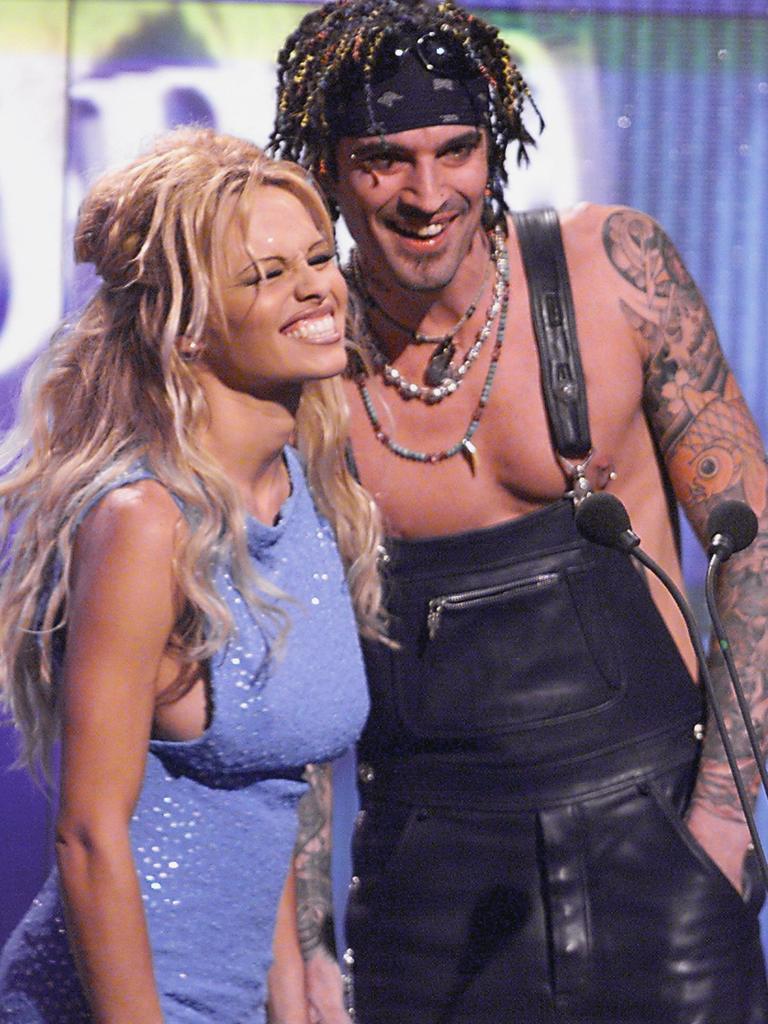 On-stage with Tommy Lee at a 1999 award show. Picture: AFP