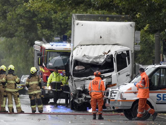 Police and fire crews at the scene of the fatal accident. Picture: Andrew Henshaw