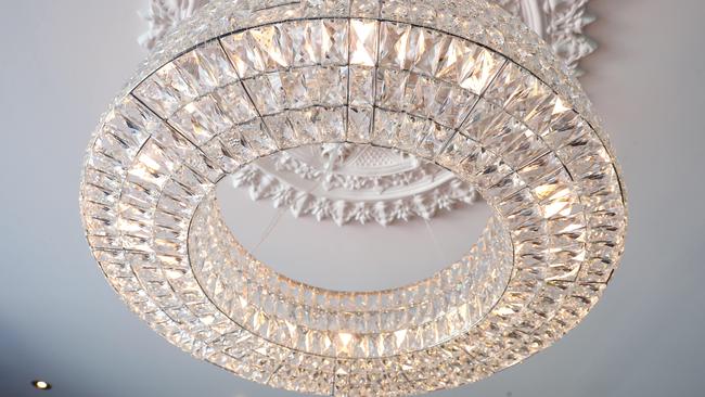 Sparkling light fittings illuminate the setting. Photo by Richard Gosling