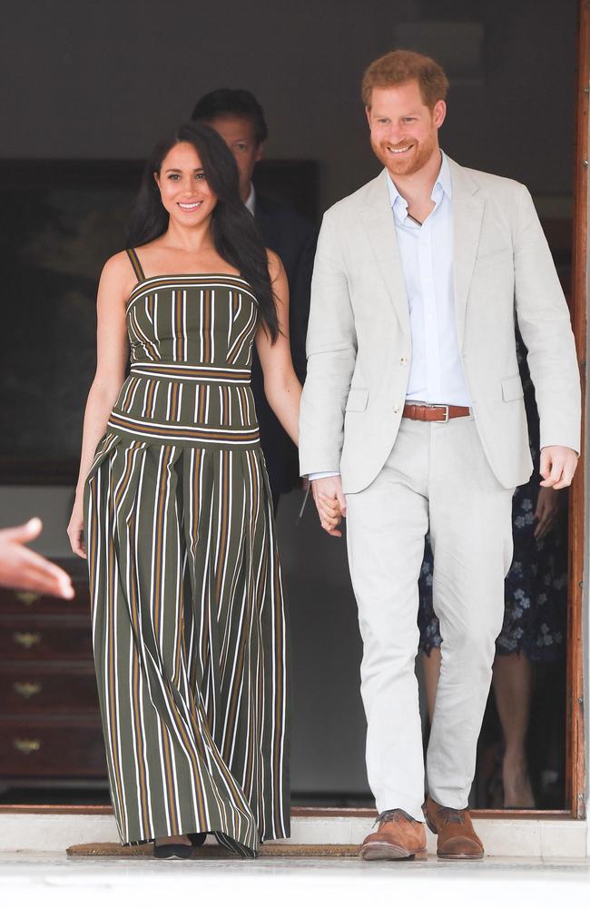 Meghan Markle, wearing Martin Grant, with Prince Harry in Cape Town, South Africa. Picture: Getty Images