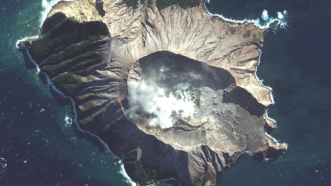 White Island off the coast of Whakatane, New Zealand, is promoted as a thrill seeker’s adventure. Picture: Maxar Technologies via AP