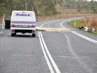 CRASH SCENE: Two Chinese tourists were killed from a pipe falling off the back of a truck near Raglan on the Bruce Highway on December 6, 2014. Picture: Ebony Battersby