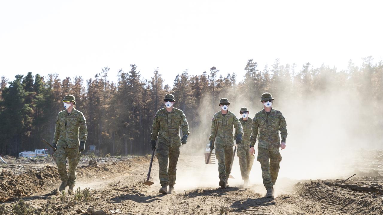 Australian Army soldiers putting out hot spots to prevent the reignition of bushfires during Operation Bushfire Assist 2019-2020. Picture: Supplied