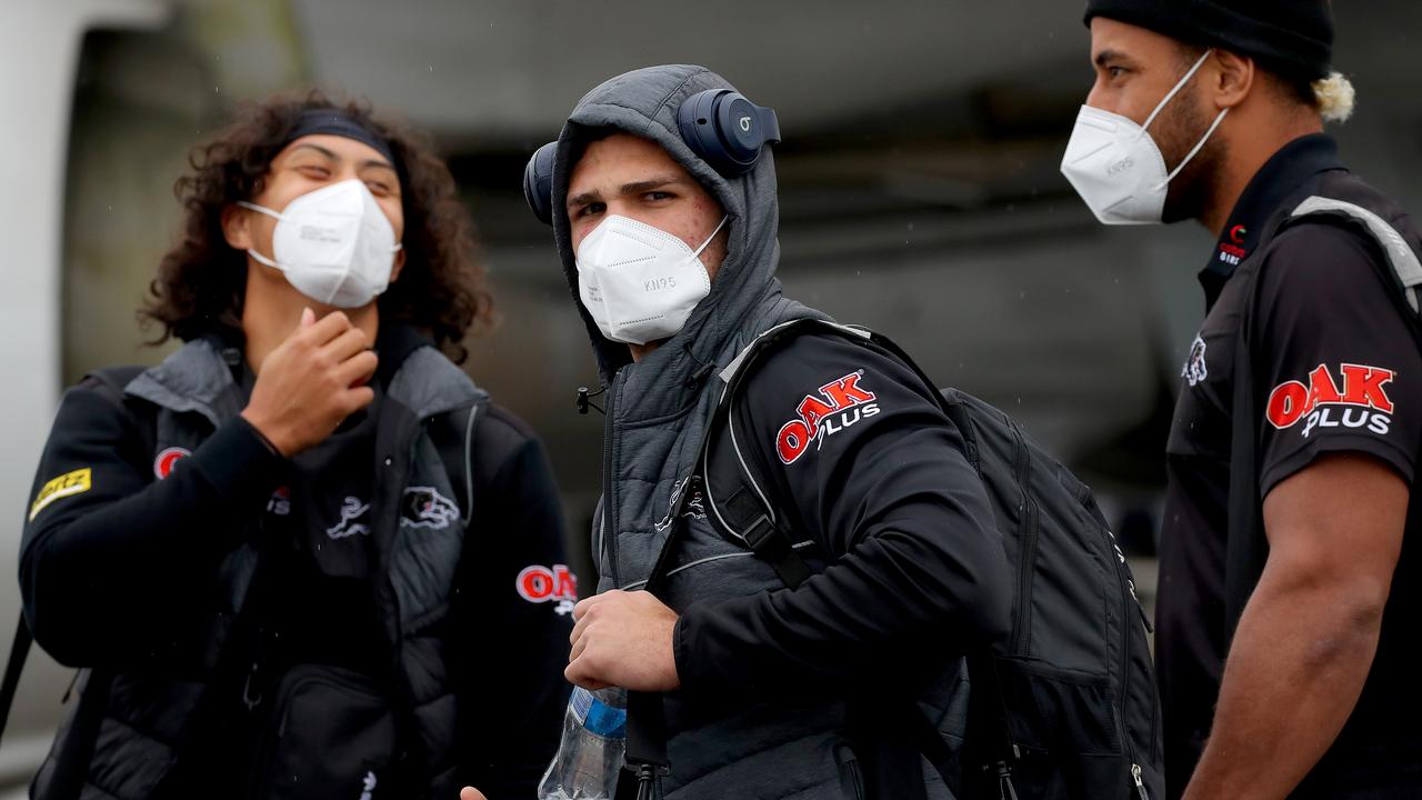 The Panthers squad including Jarome Luai (left) and Nathan Cleary (centre) travelling Covid-style Picture: Toby Zerna