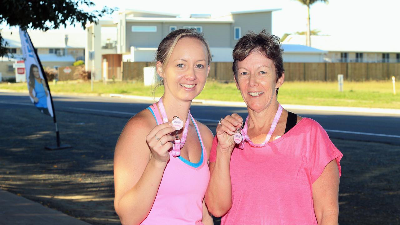 Mother and Daughter, Donna Pain (right) and Lettesha Morgan display their medals for completing the 5km and 10km run in the Mother's Day Classic. Photo: Fraser Coast Chronicle/ File