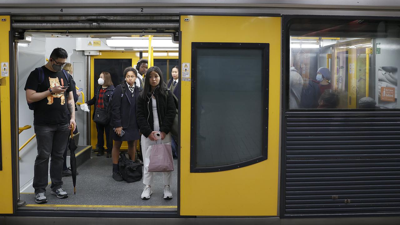 Commuters stood close together as carriages filled up quickly. Picture: Dylan Coker