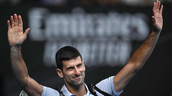 Serbia's Novak Djokovic acknowledges applauds by the supporters as he walks off the court after losing against Italy's Jannik Sinner. Picture: Lillian Suwanrumpha / AFP.