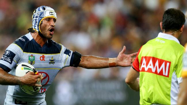 Johnathan Thurston of the Cowboys argues with the ref during the NRL match between the Brisbane Broncos and the North Queensland Cowboys. Pic Darren England