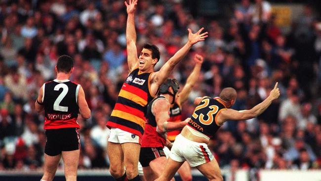 Darren Jarman on his way to kicking 6.2 in Adelaide’s 1997 grand final victory.