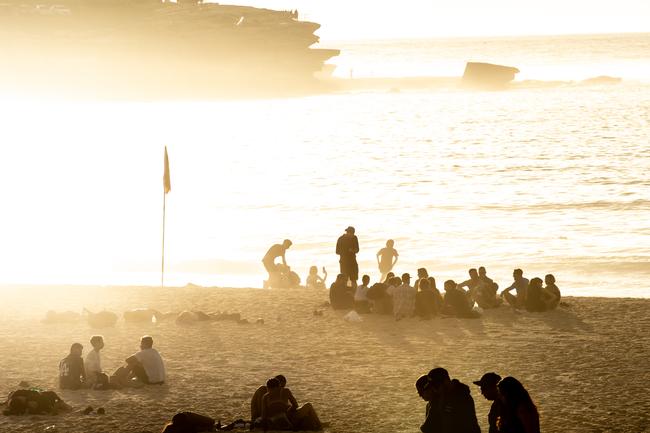 The party continues at Bondi Beach around 6am Tuesday January 1 2018. Picture: Monique Harmer