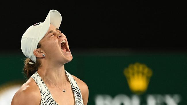 Ash Barty lets out a primeval roar after match point. Picture: Michael Errey/AFP