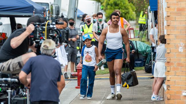 Young Rock actors Adrian Groulx as a young Dwayne Johnson and Joseph Lee Anderson as Rocky Johnson film scenes at Wynnum, Brisbane. Picture: Nigel Wesley