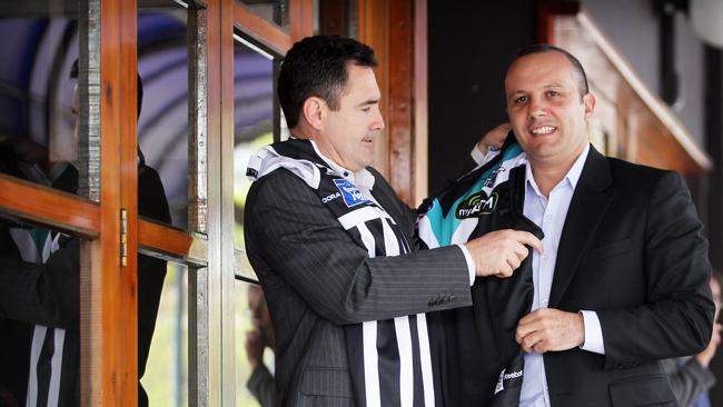 Port Adelaide Magpies premiership players Tim Ginever and George Fiacchi.