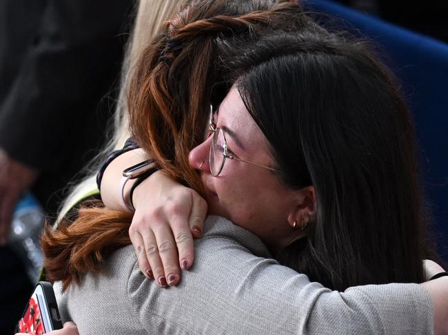 Kamala Harris supporters hug after she was defeated by Donald Trump. Picture: AFP