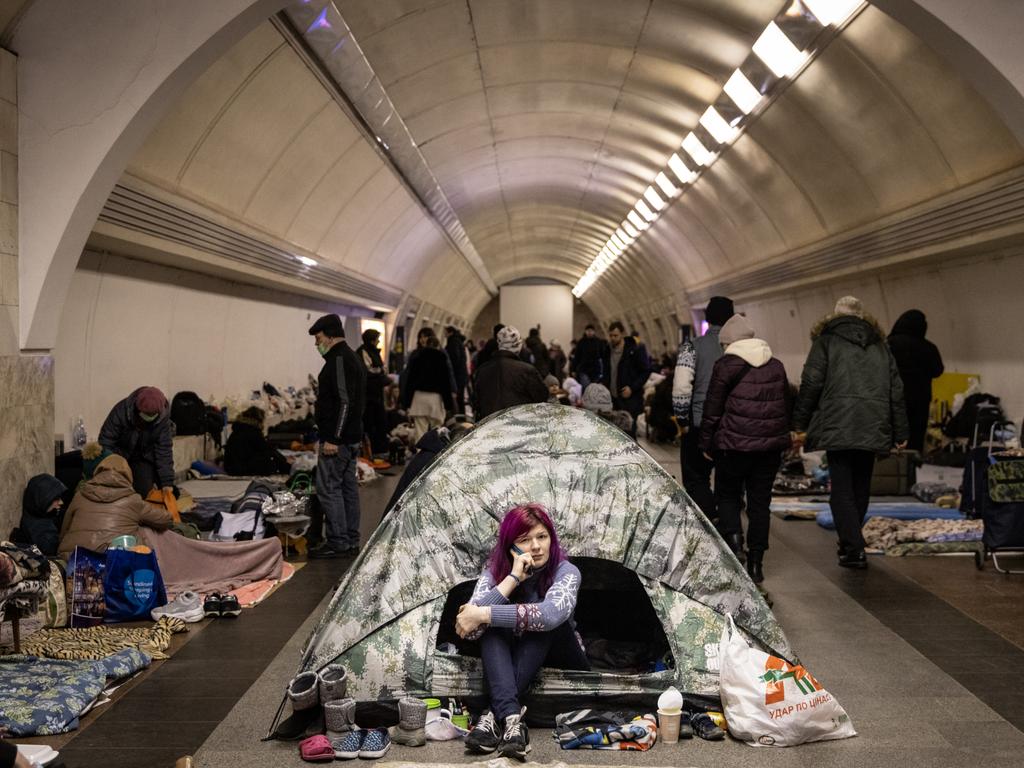 A woman sits in a tent as people take shelter in the Dorohozhychi subway station which has has been turned into a bomb shelter in Kyiv, Ukraine. Picture: Getty Images