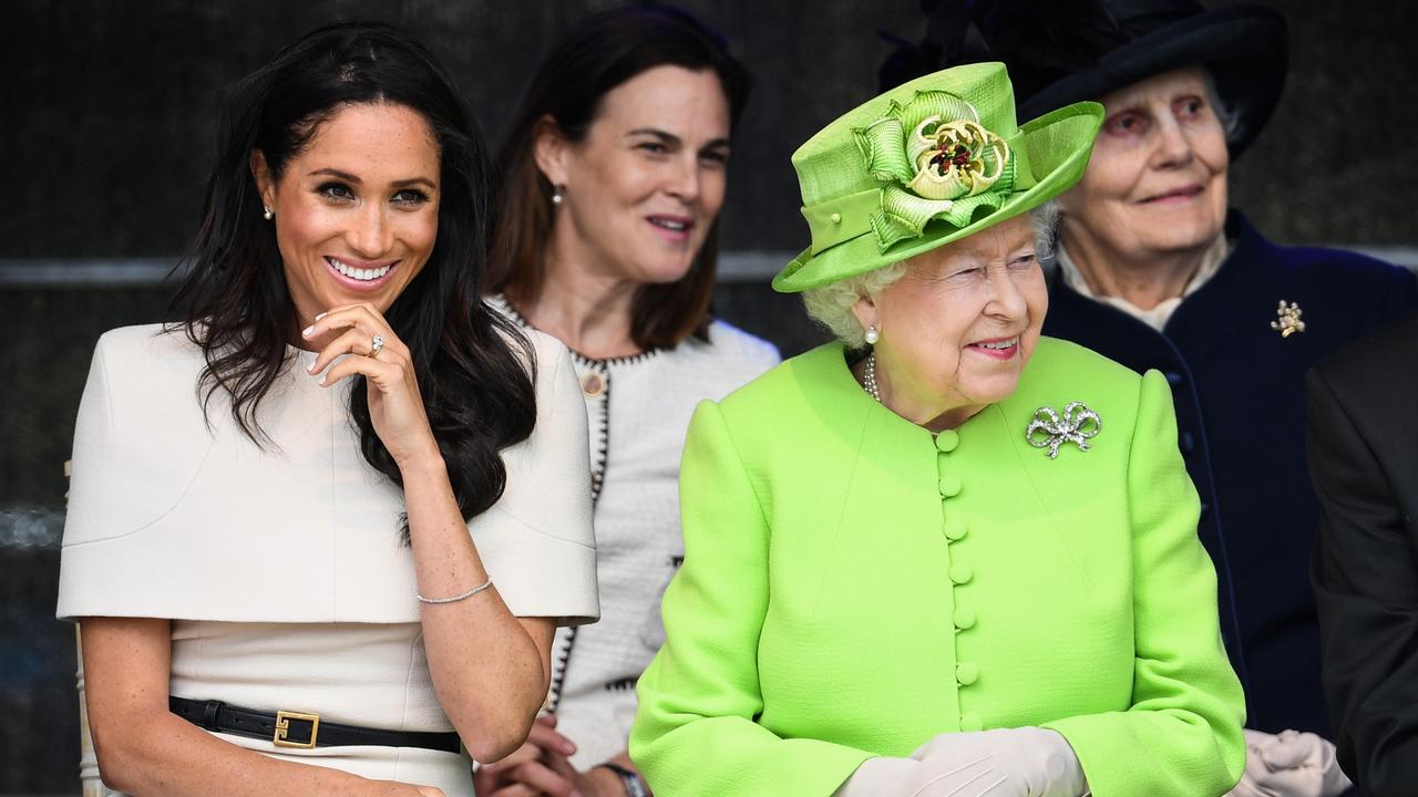 The Duchess of Sussex, private assistant Samantha Cohen and Queen Elizabeth II during a ceremony to open the new Mersey Gateway Bridge on June 14 in Cheshire, England. Picture: Jeff J Mitchell/Getty Images.