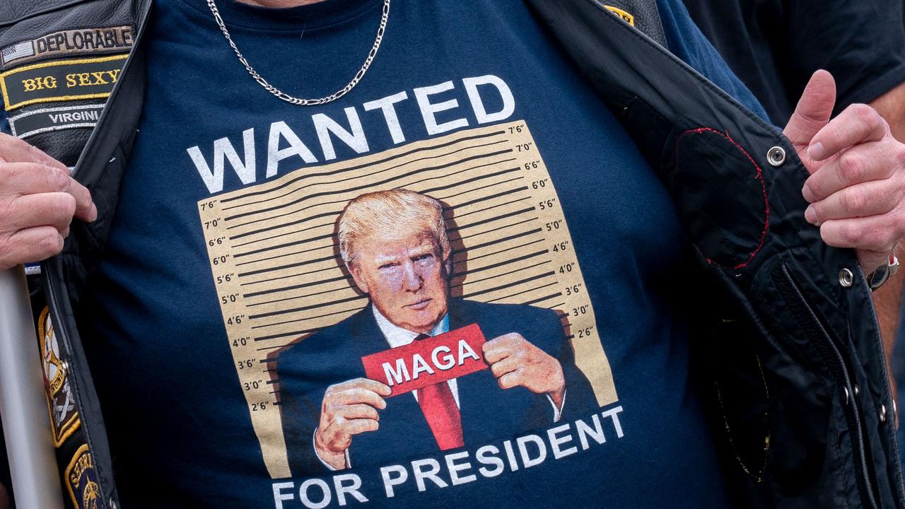 A demonstrator stands outside the E. Barrett Prettyman US Courthouse in Washington, DC, on August 3, 2023, ahead of the arraignment of former US President Donald Trump. Picture: Stefani Reynolds / AFP