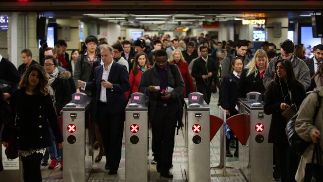 Sydney commuters battle rush hour.