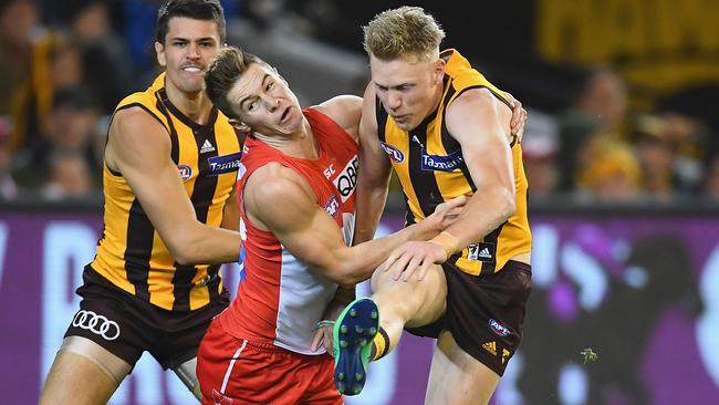 James Sicily is tackled by Ben Ronke.