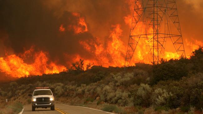 La Ninas may bring rain to eastern Australia but they suck moisture away from the southern US. The fierce Californian bushfires of August 2021 coincided with a La Nina. Picture: Justin Sullivan/Getty Images/AFP.