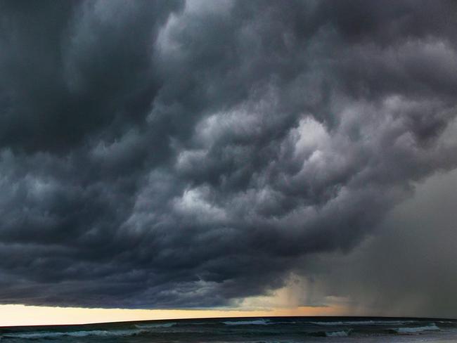 A severe thunderstorm lashed the Gold Coast and northern New South Wales this afternoon and into the evening. While the rain and hail sent most people diving and running for cover, some budding photographers snapped away at the dark cloud formations. This photo was taken by Craig Mcneilly