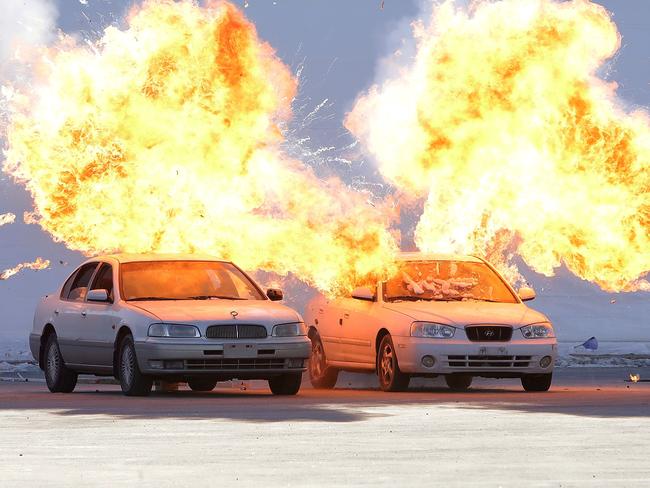 PYEONGCHANG-GUN, SOUTH KOREA - DECEMBER 12:  Cars explode during a anti-terror drill at the Olympic Staduim, venue of the Opening and Closing ceremony, on December 12, 2017 in Pyeongchang-gun, South Korea. Police, firefighters and organization committee members took part in the drill simulating possible terror attacks during the PyeongChang 2018 Olympic Games.  (Photo by Chung Sung-Jun/Getty Images)