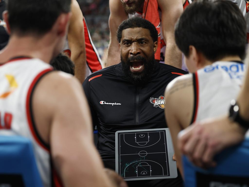 Hawks coach Justin Tatum talks to his team during the close clash with the Phoenix. Picture: Getty Images