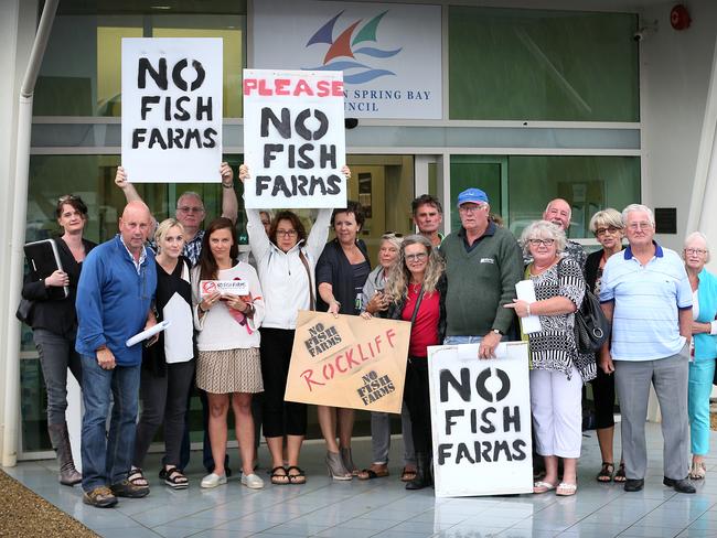 Anti-fish farm protesters outside the council chambers after the meeting.